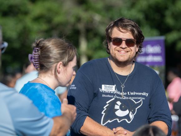 Student Government Association member Nicholas Smith smiling at an event