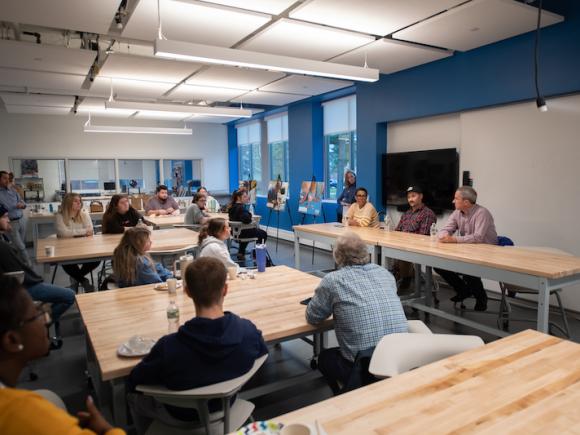 Students, faculty and staff participate in the Entrepreneurs of Western Mass panel discussion on November 6 at the RIDE center. 