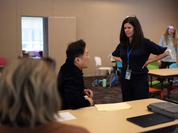 Catherine Savini, Director of the Reading and Writing Center at Westfield State, presenting her AI workshop at the WMWP event in October.