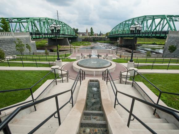 Westfield, MA center with two green bridges and fountain in center.