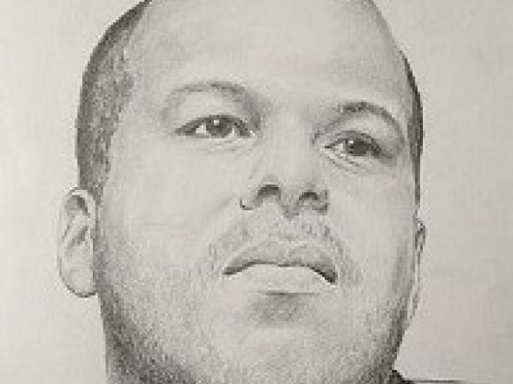 Sketch drawing of art faculty member George Ramirez.