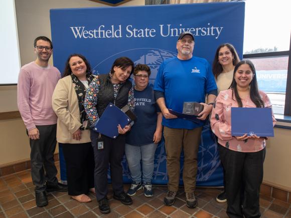 Group photo of staff and faculty at Employee Recognition Breakfast.