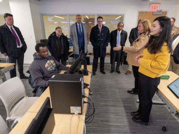 The Finance and Accounting Club touring the Data and Analytics Lab in Parenzo Hall with University Trustee George Gilmer.