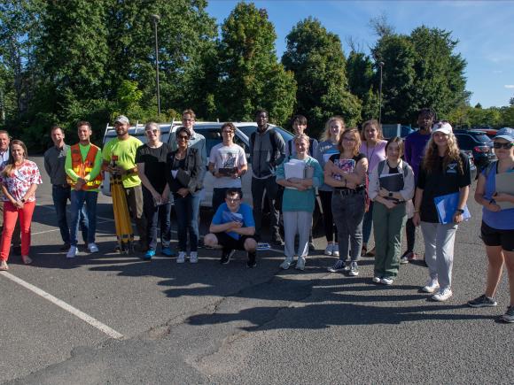 Students do a site survey to plan out changes to a middle school parking lot.