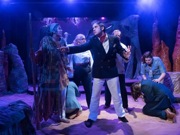 Students in costumes participating in an on campus production.