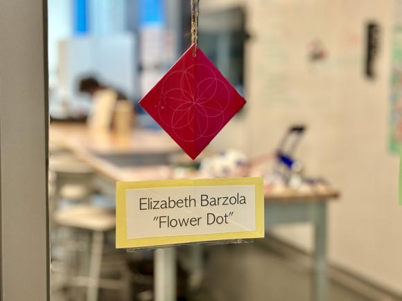 Red geometrical pattern created in a math explorations class.