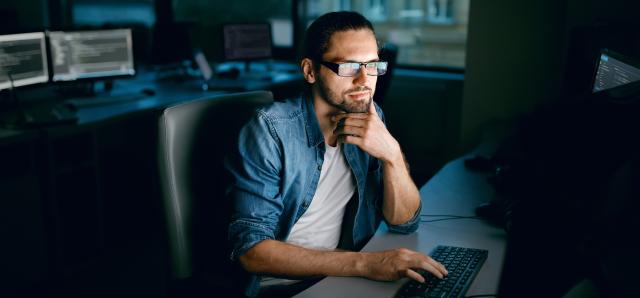 Man sitting at computer