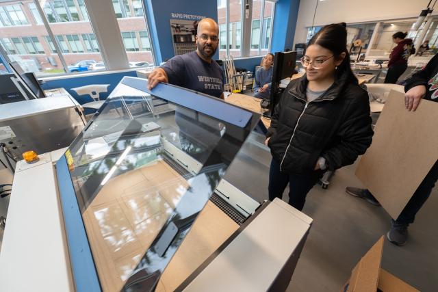 Professor and a student working on a project in the RIDE Center.