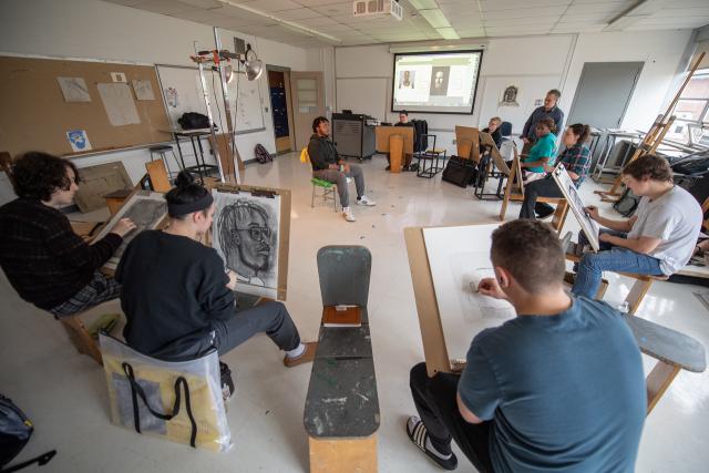 Dower 276 Drawing Studio showcasing students in a circle sketch drawing.