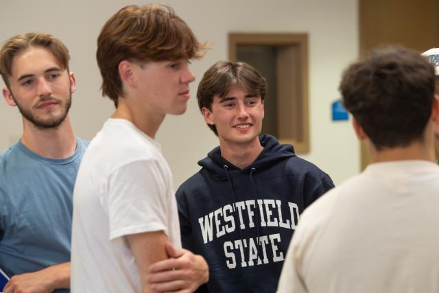 Group of students smiling at New Student Orientation.