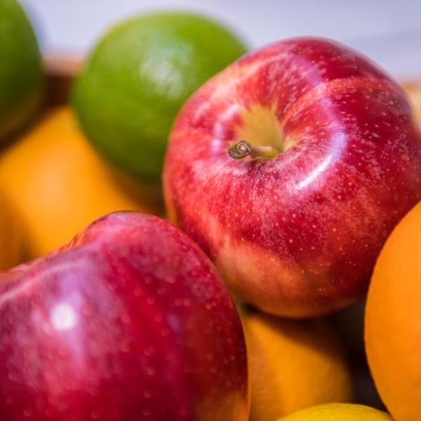 Vibrant apples, oranges, and limes.