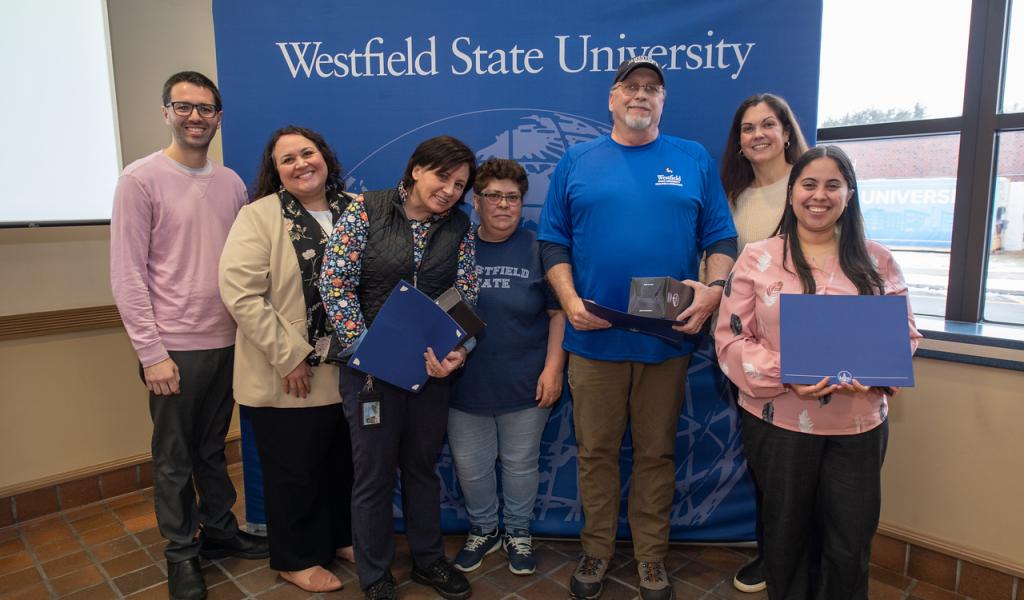 Group photo of staff and faculty at Employee Recognition Breakfast.